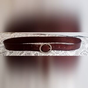 Vintage brown leather belt with silver round buckle